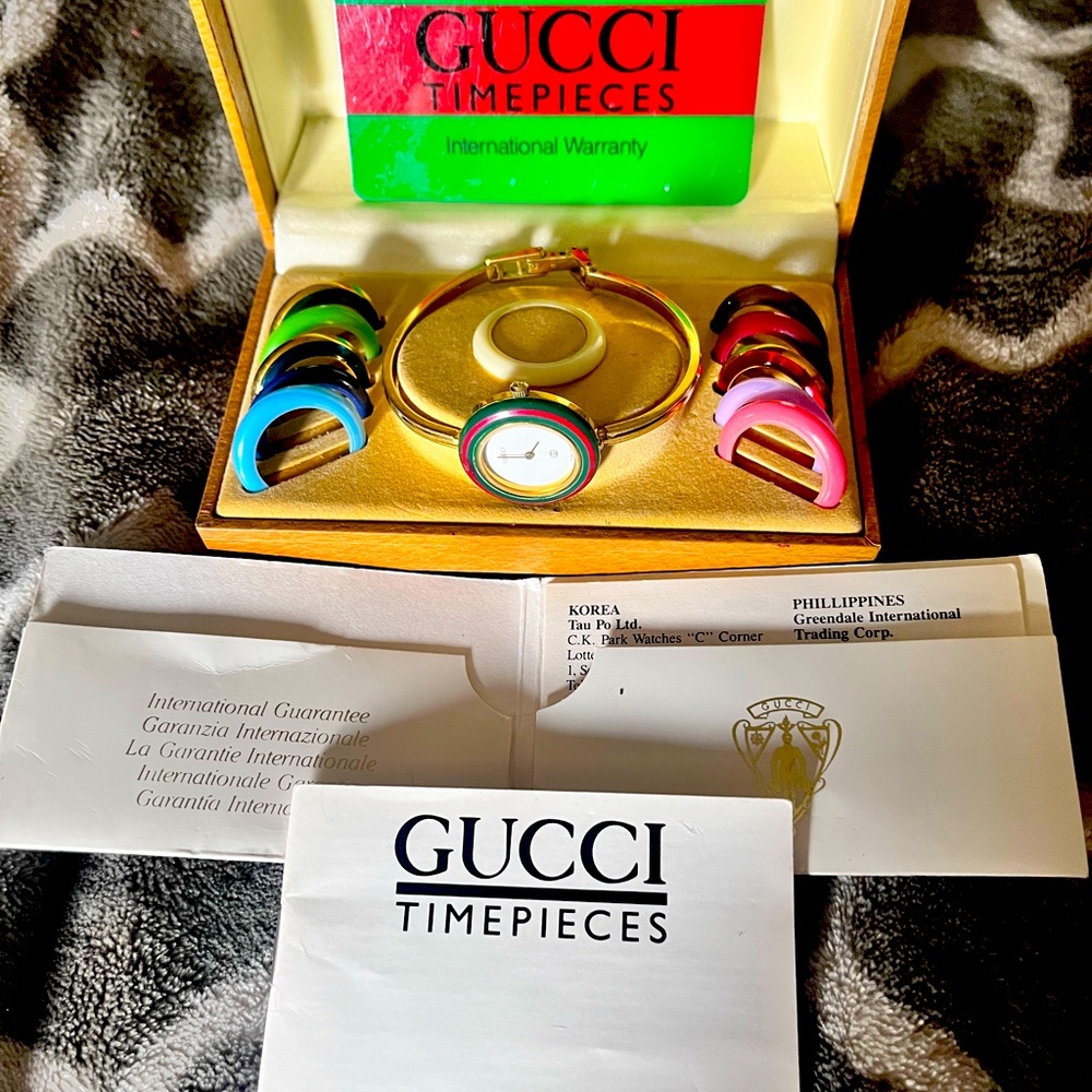 Gucci timepiece with interchangeable bezel pieces